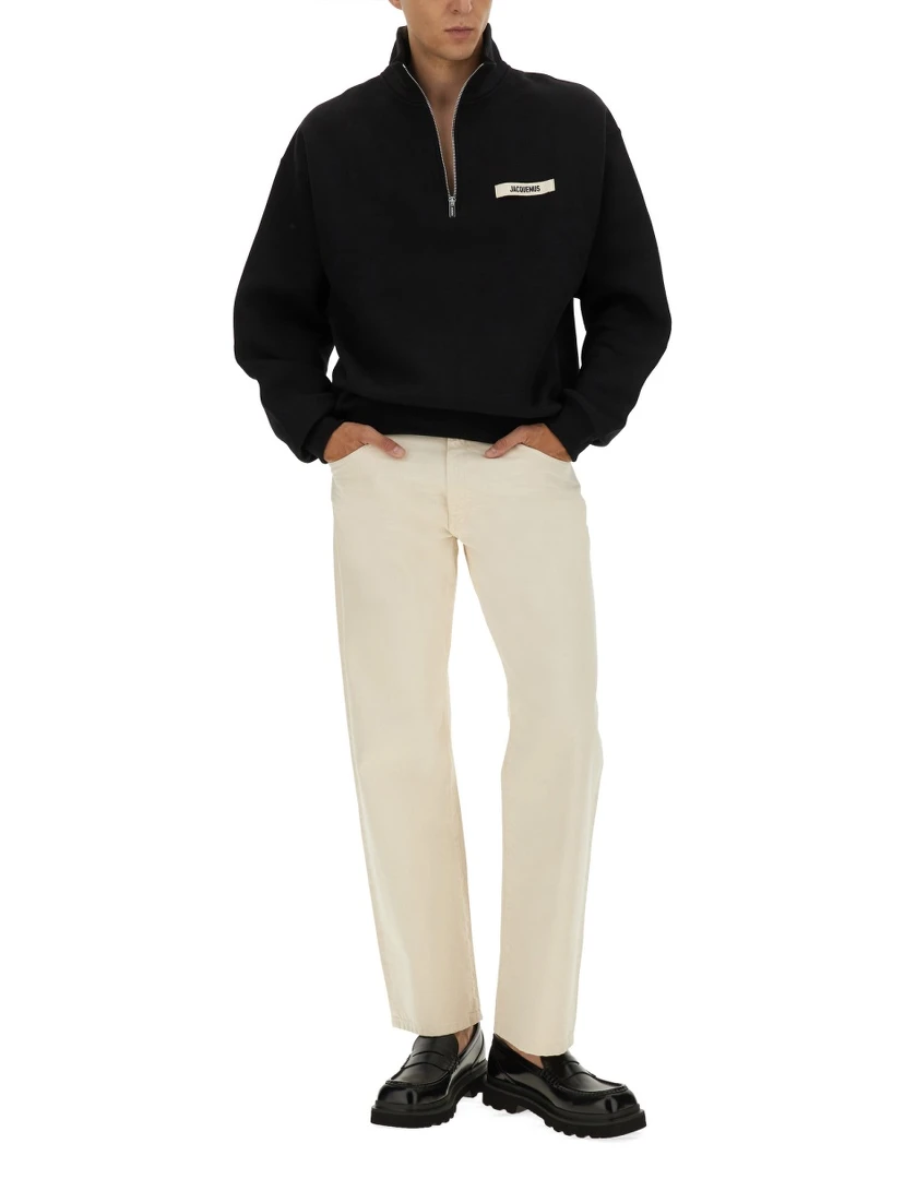 ZIPPERED TURTLENECK SWEATSHIRT