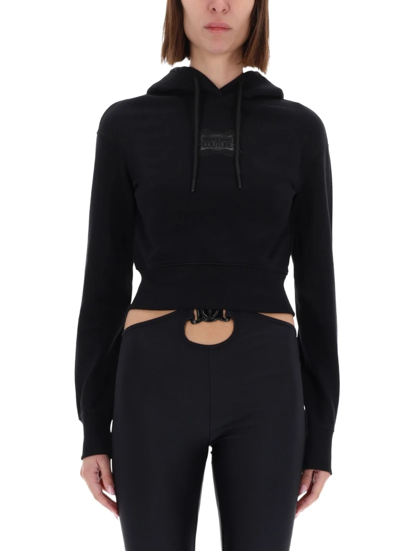CROPPED SWEATSHIRT WITH "BAROQUE" LOGO PATCH