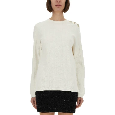 KNITTED TOPS.