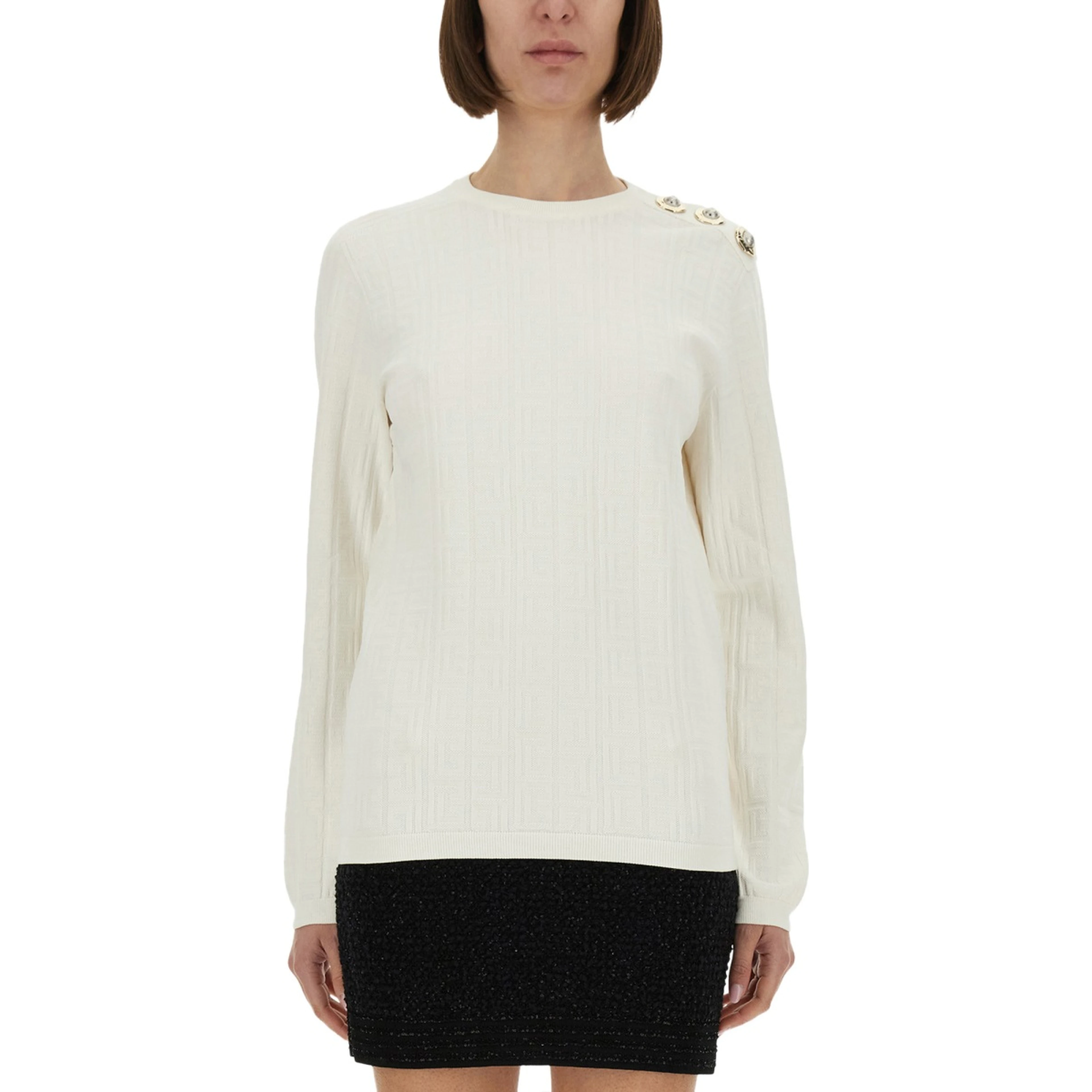 KNITTED TOPS.