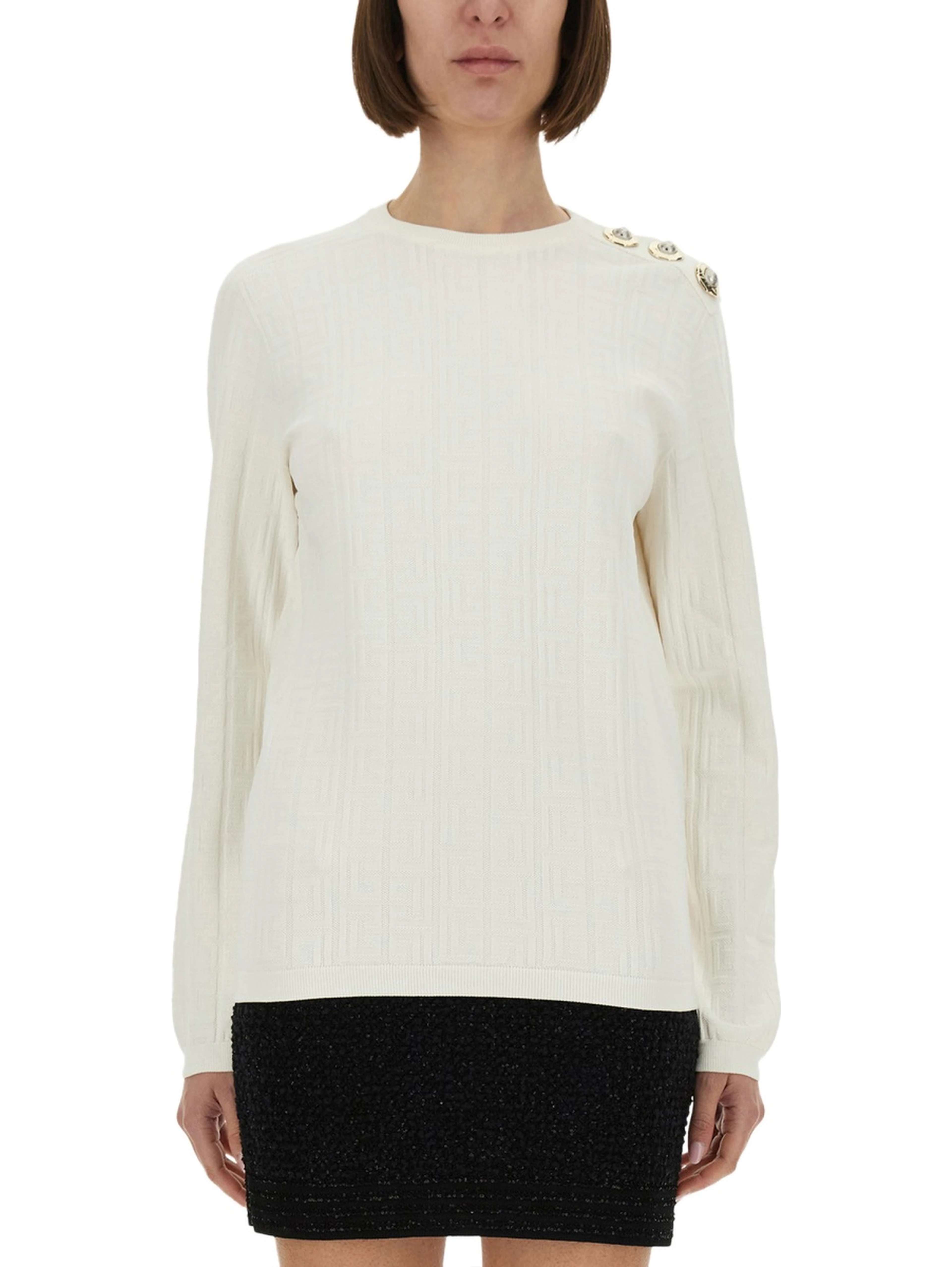 KNITTED TOPS.