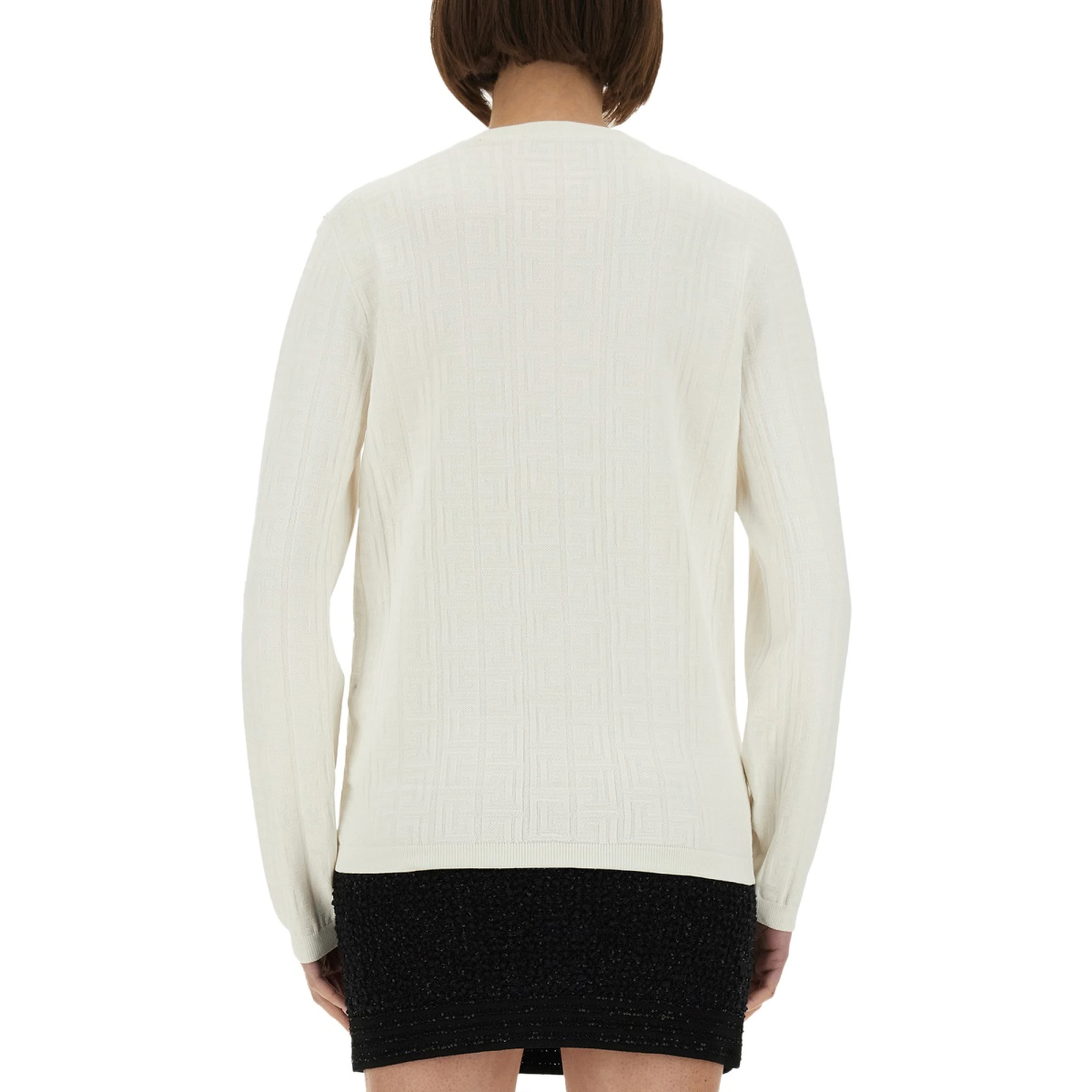 KNITTED TOPS.