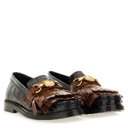 MOCCASIN WITH BANGS AND COIN