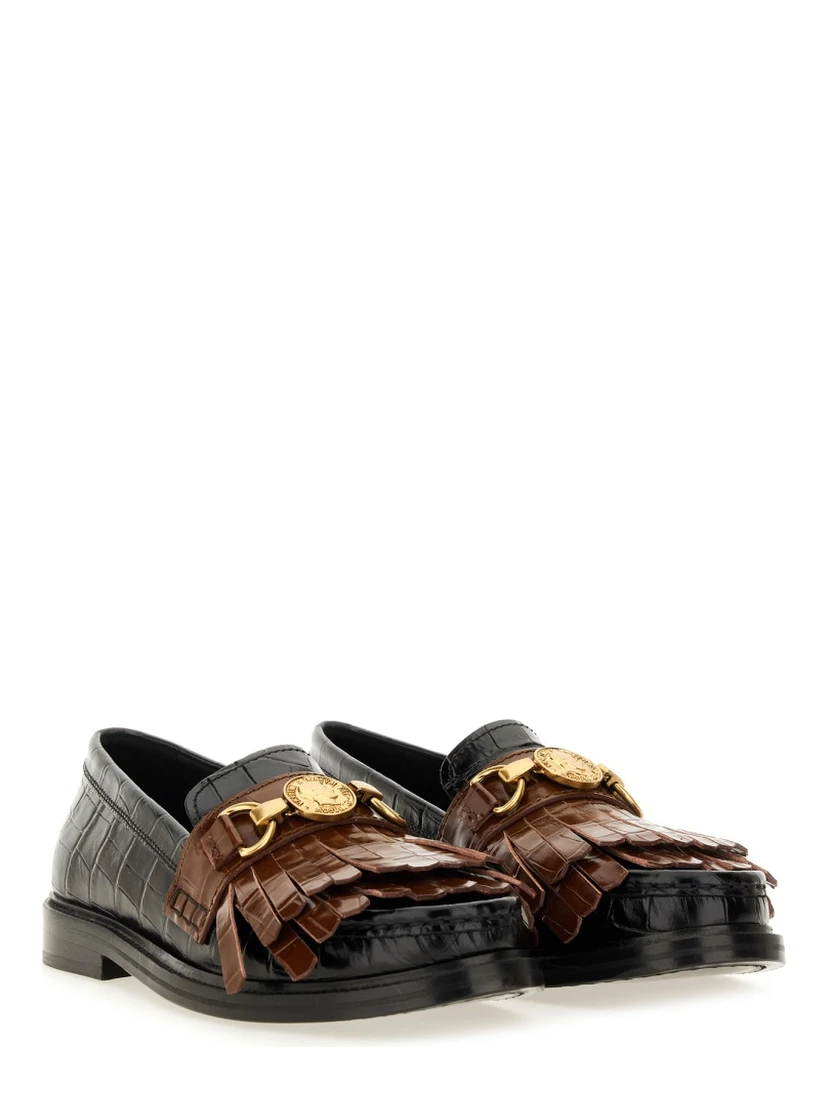 MOCCASIN WITH BANGS AND COIN