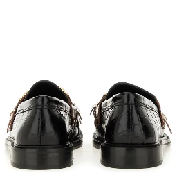 MOCCASIN WITH BANGS AND COIN