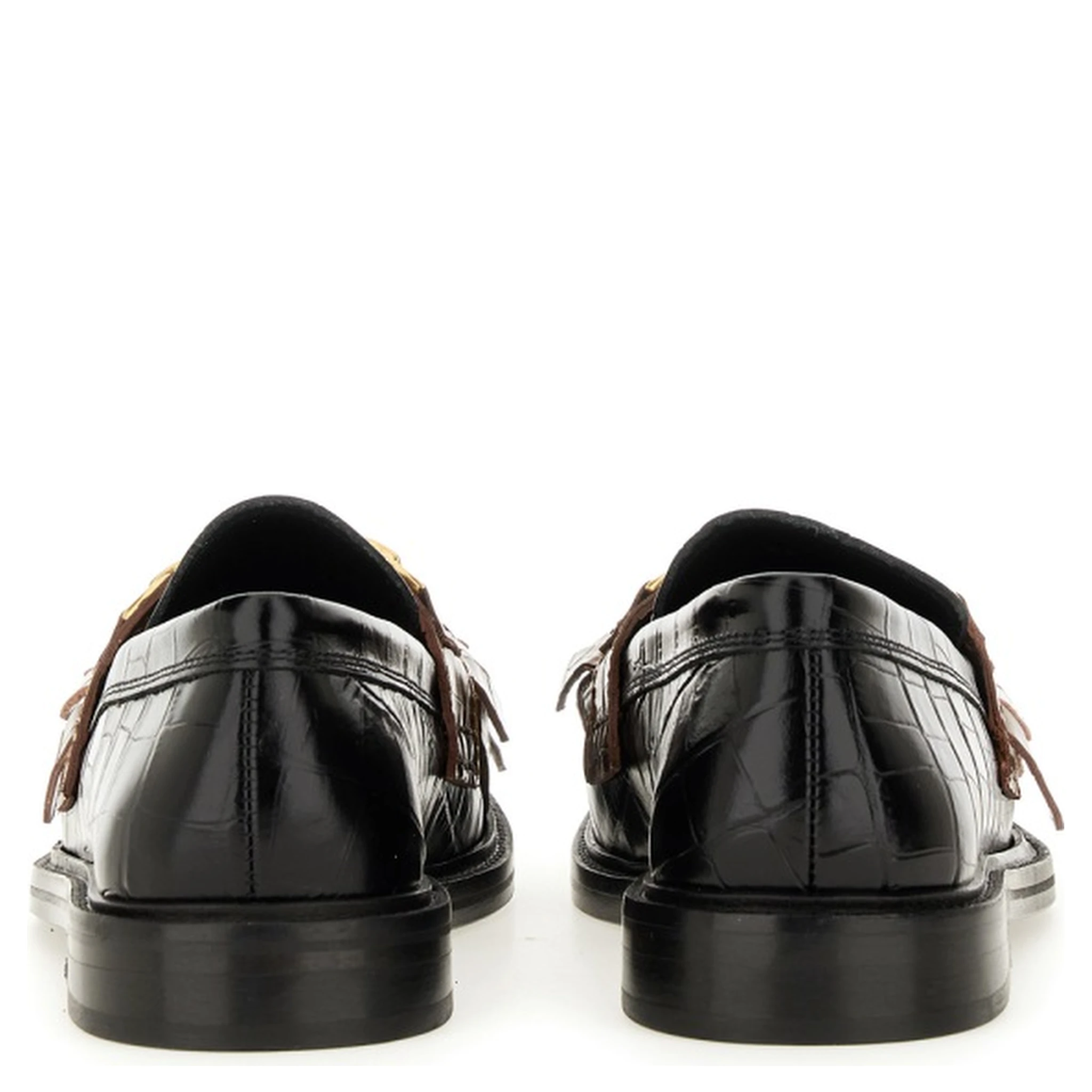 MOCCASIN WITH BANGS AND COIN