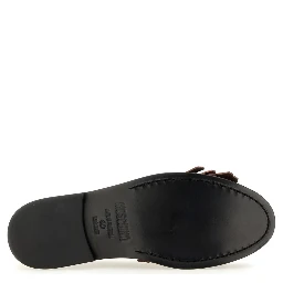 MOCCASIN WITH BANGS AND COIN