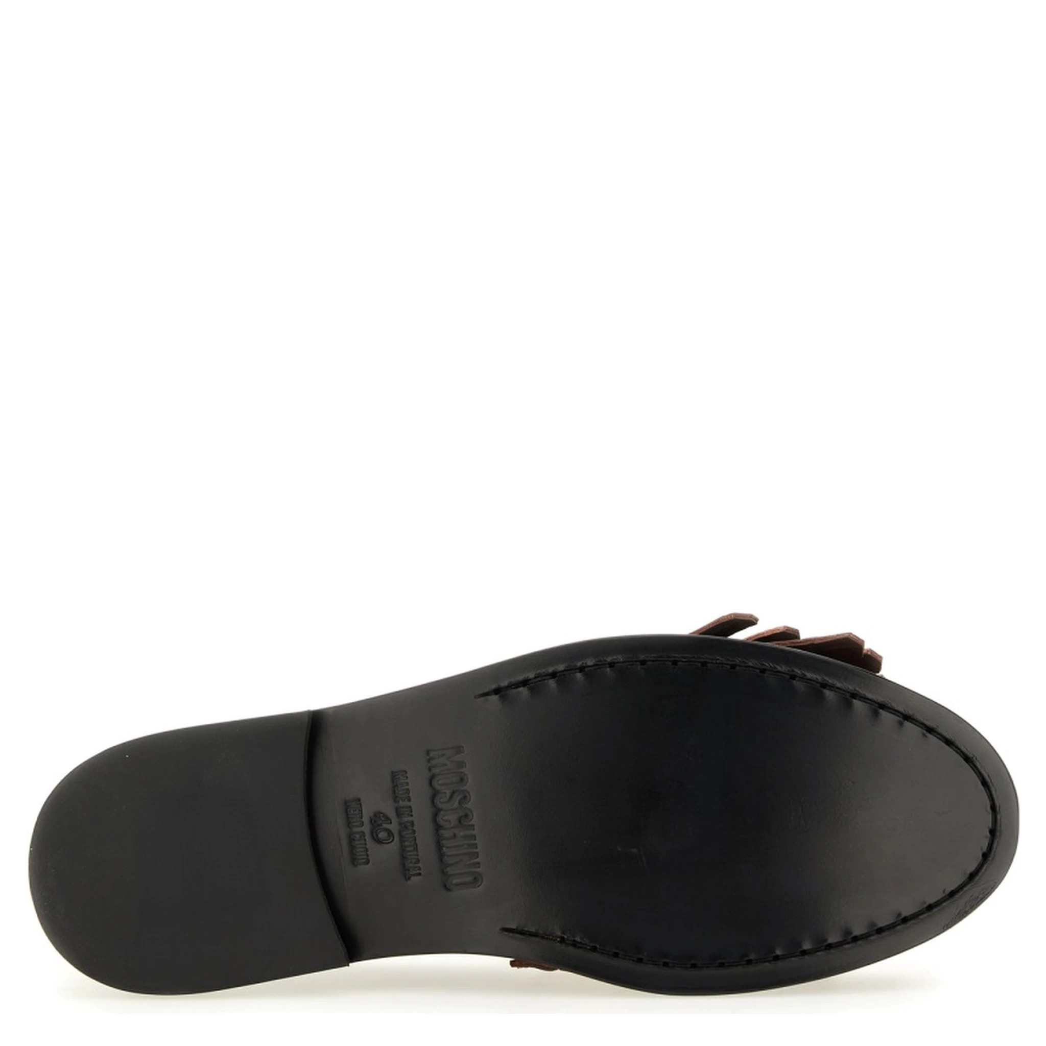 MOCCASIN WITH BANGS AND COIN