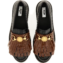 MOCCASIN WITH BANGS AND COIN