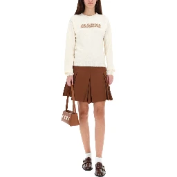 PLEATED MINISKIRT