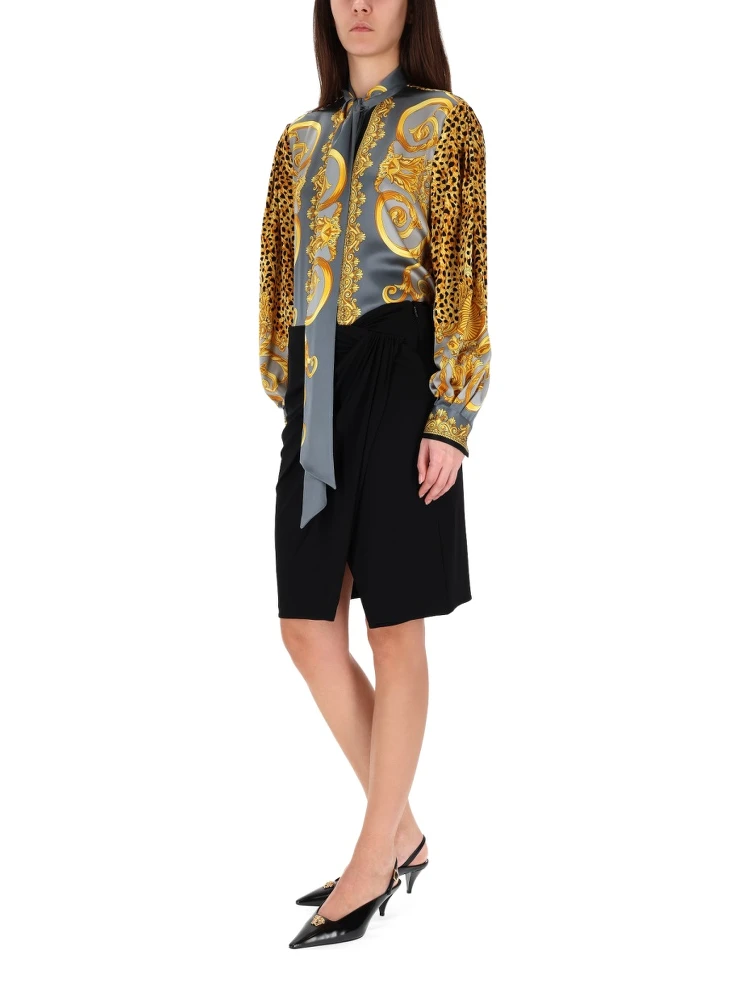 MIDI SKIRT WITH ASYMMETRICAL HEMLINE alternative