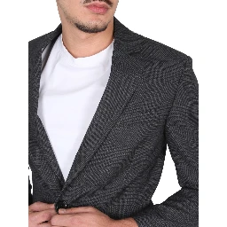 جاكيت من الصوف البكر بصف أزرار واحد