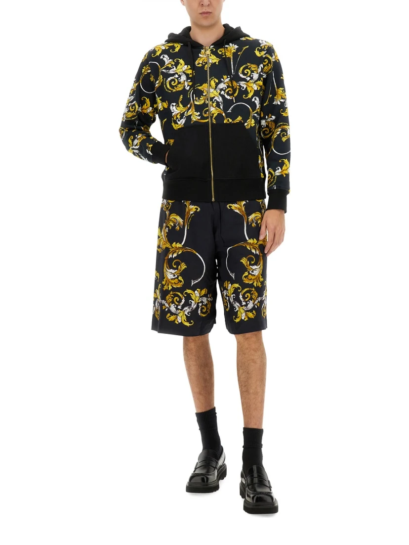 SHORTS WITH BAROQUE OUTLINE PRINT