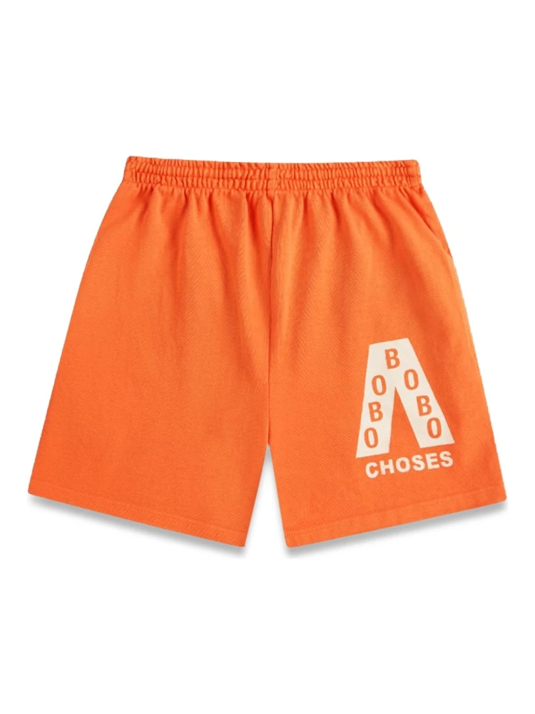 ORANGE SHORTS WITH LOGO