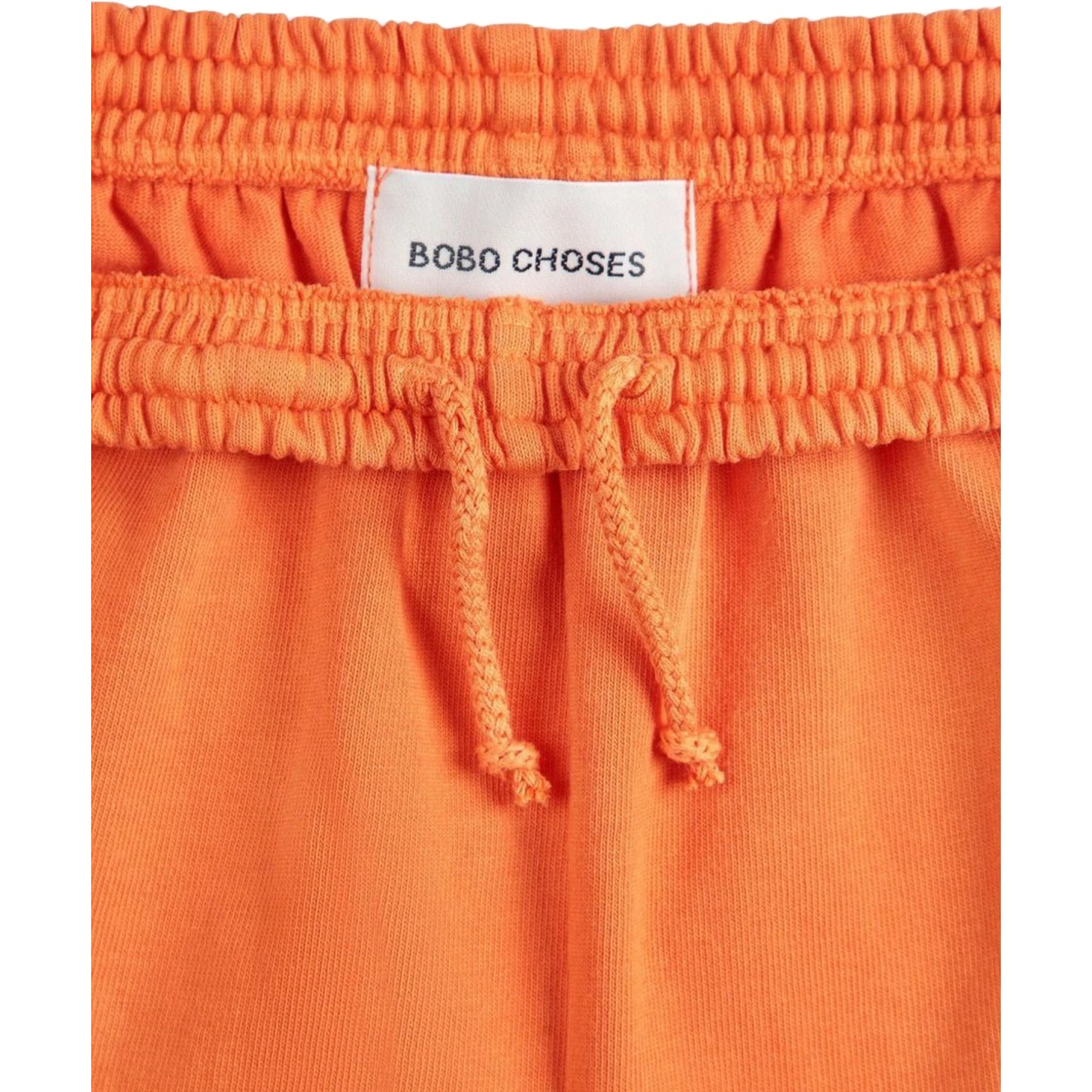 ORANGE SHORTS WITH LOGO