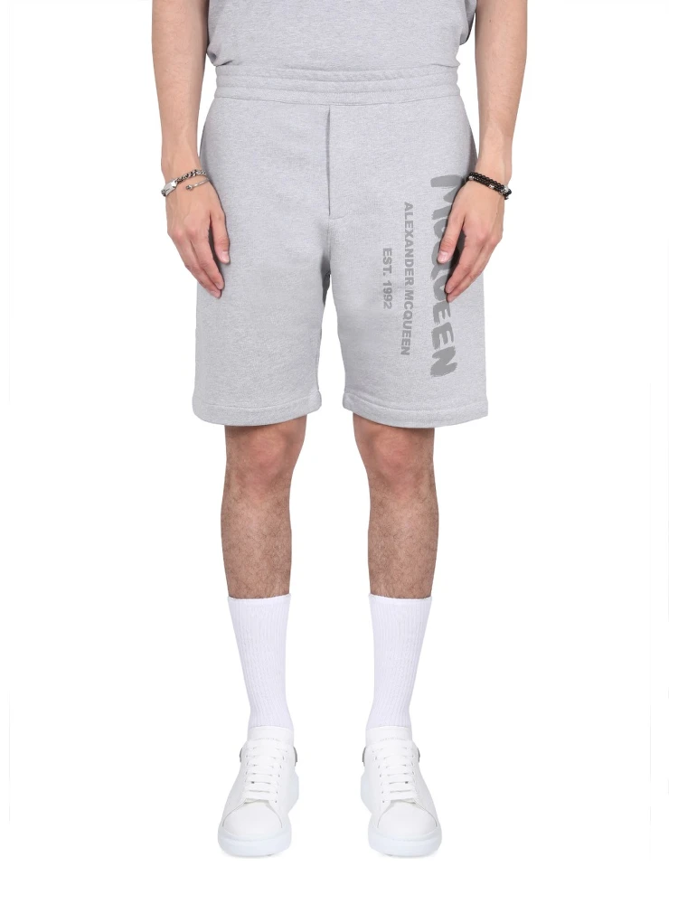 BERMUDA SHORTS WITH GRAFFITI LOGO PRINT