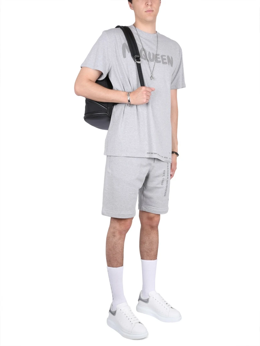 BERMUDA SHORTS WITH GRAFFITI LOGO PRINT