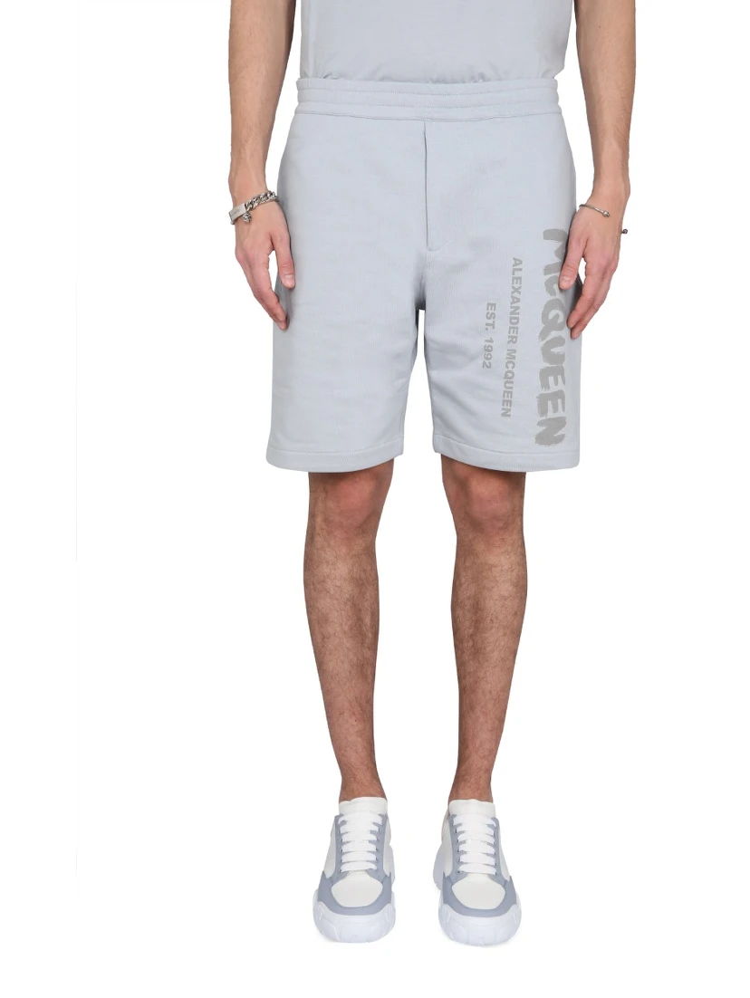 BERMUDA SHORTS WITH GRAFFITI LOGO PRINT
