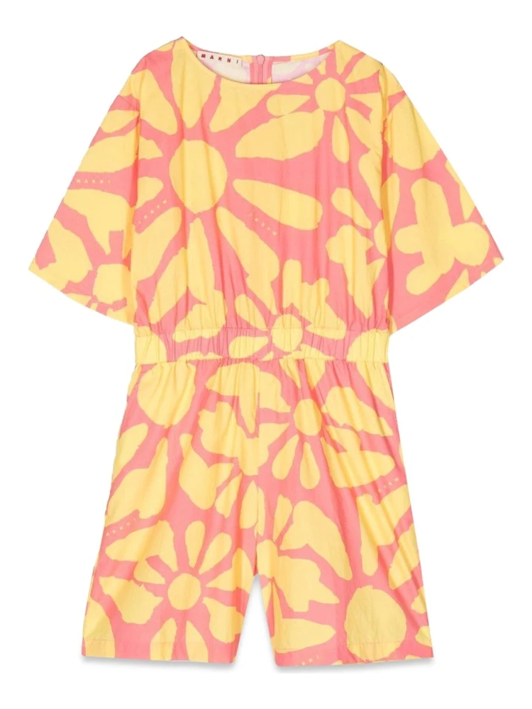 mc jumpsuit and patterned shorts