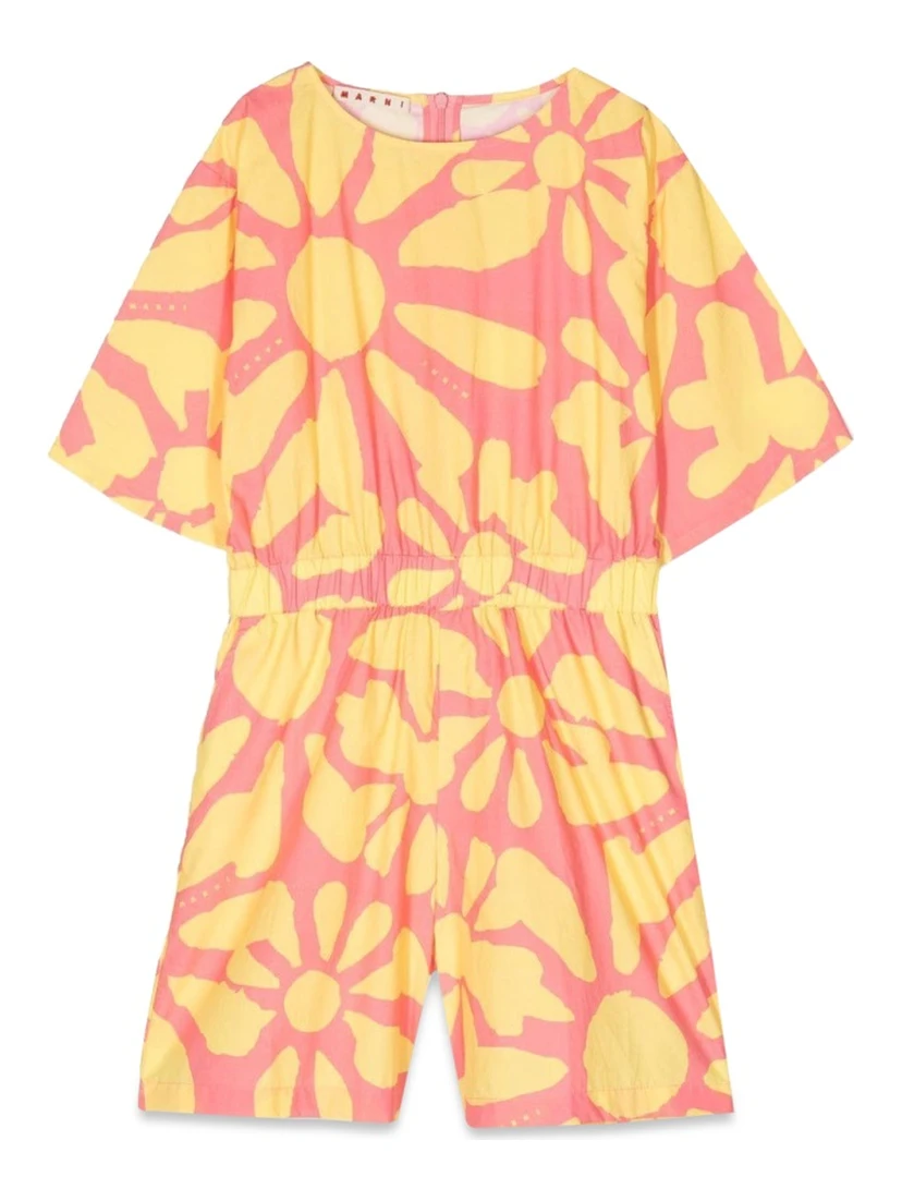 mc jumpsuit and patterned shorts