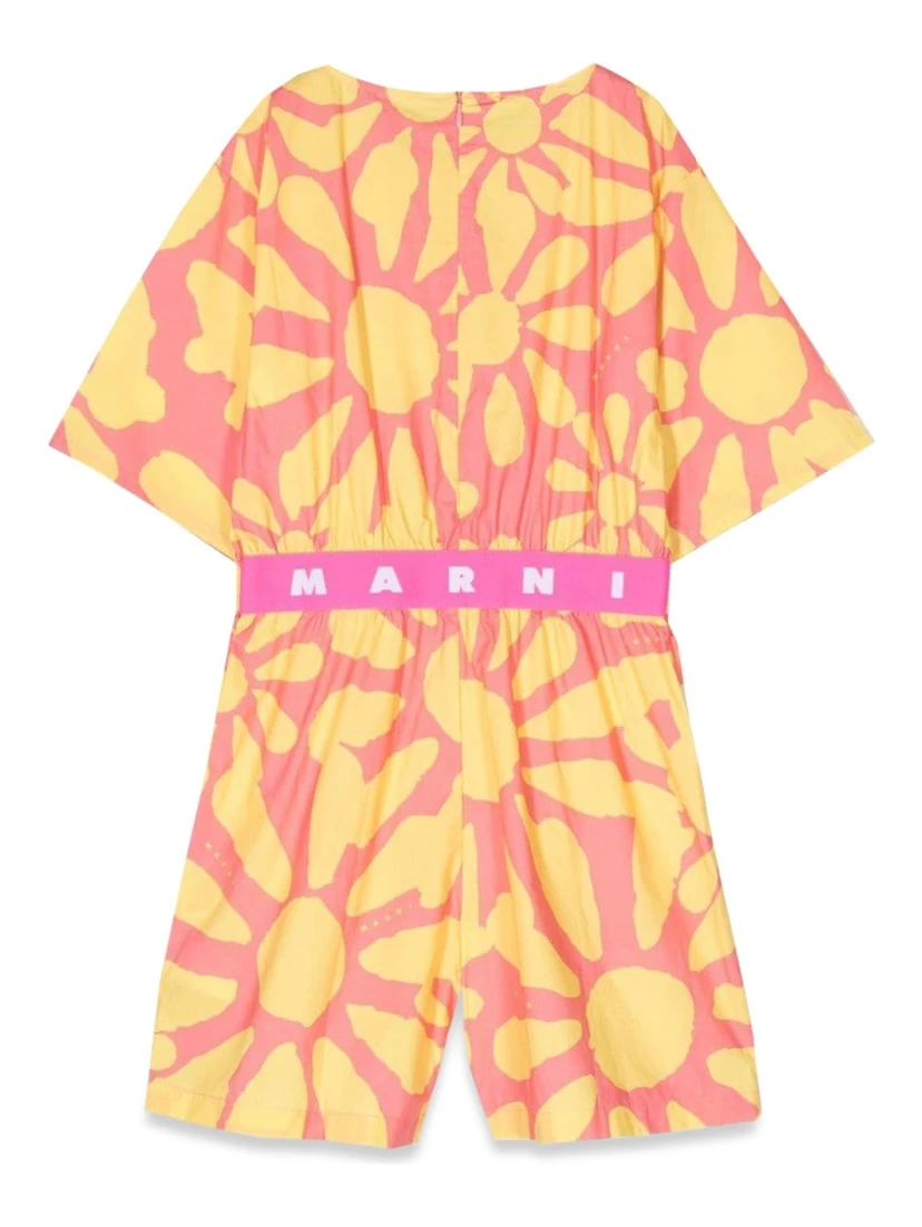 mc jumpsuit and patterned shorts
