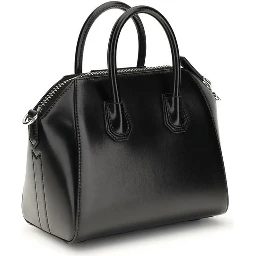 حقيبة يد بوس توروس من جلد العجل الأسود