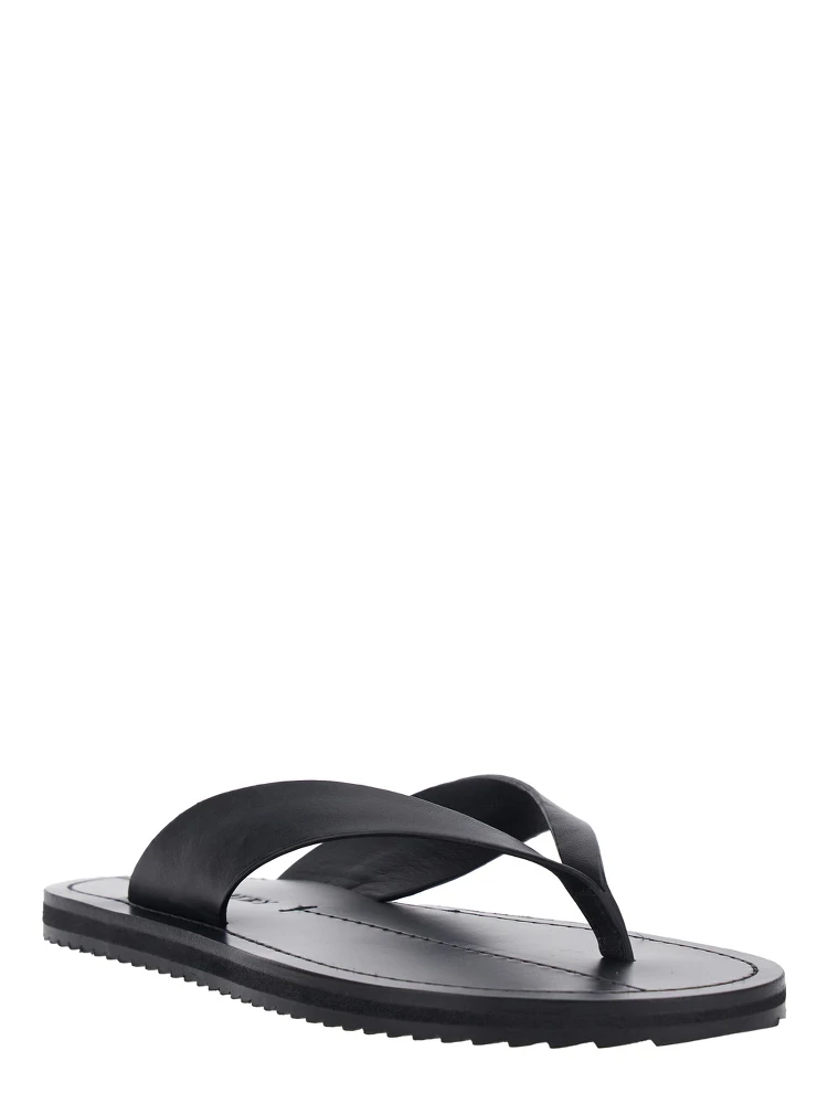Flora Black Sandals with Flip-Flop Design and Grooved Sole in Leather Woman alternative
