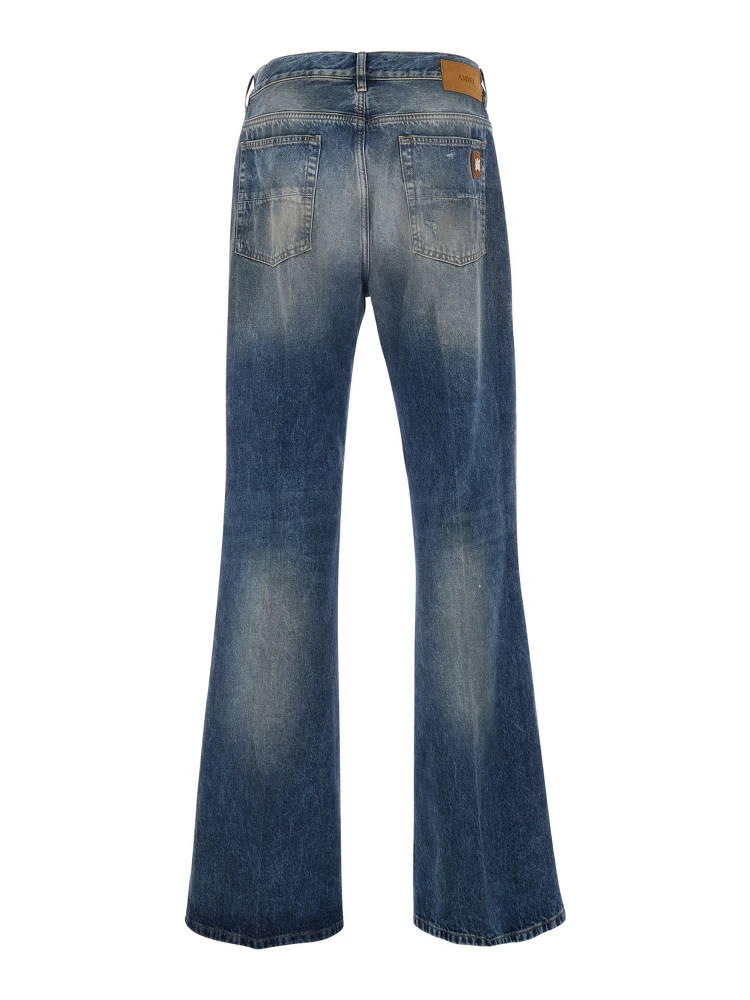 Blue Jeans with Rips on the Front and Logo Patch on the Back in Cotton Man alternative