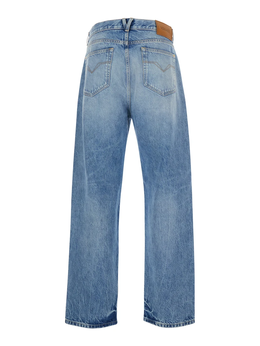 Blue Jeans with Back Logo Patch and Faded Effect in Denim Man