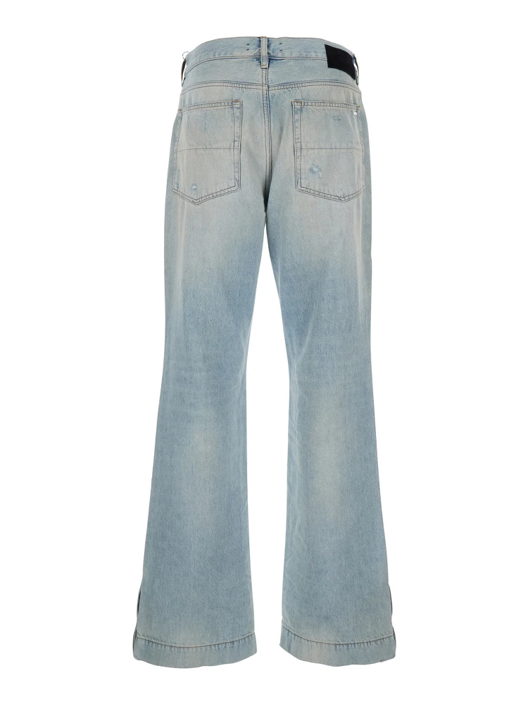 Light Bliue Jeans with Flared Leg and Ripped Details in Denim Man alternative