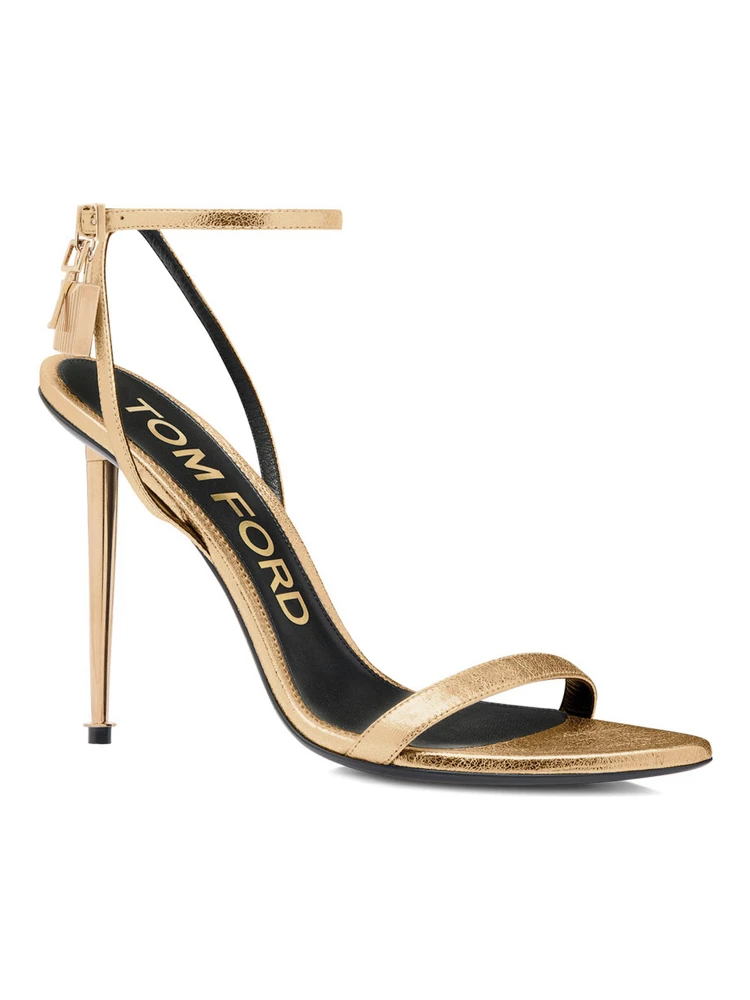 Gold Colored Pumps with High Stiletto Heel and Pendant Detail on the Ankle in Patent Leather Woman alternative