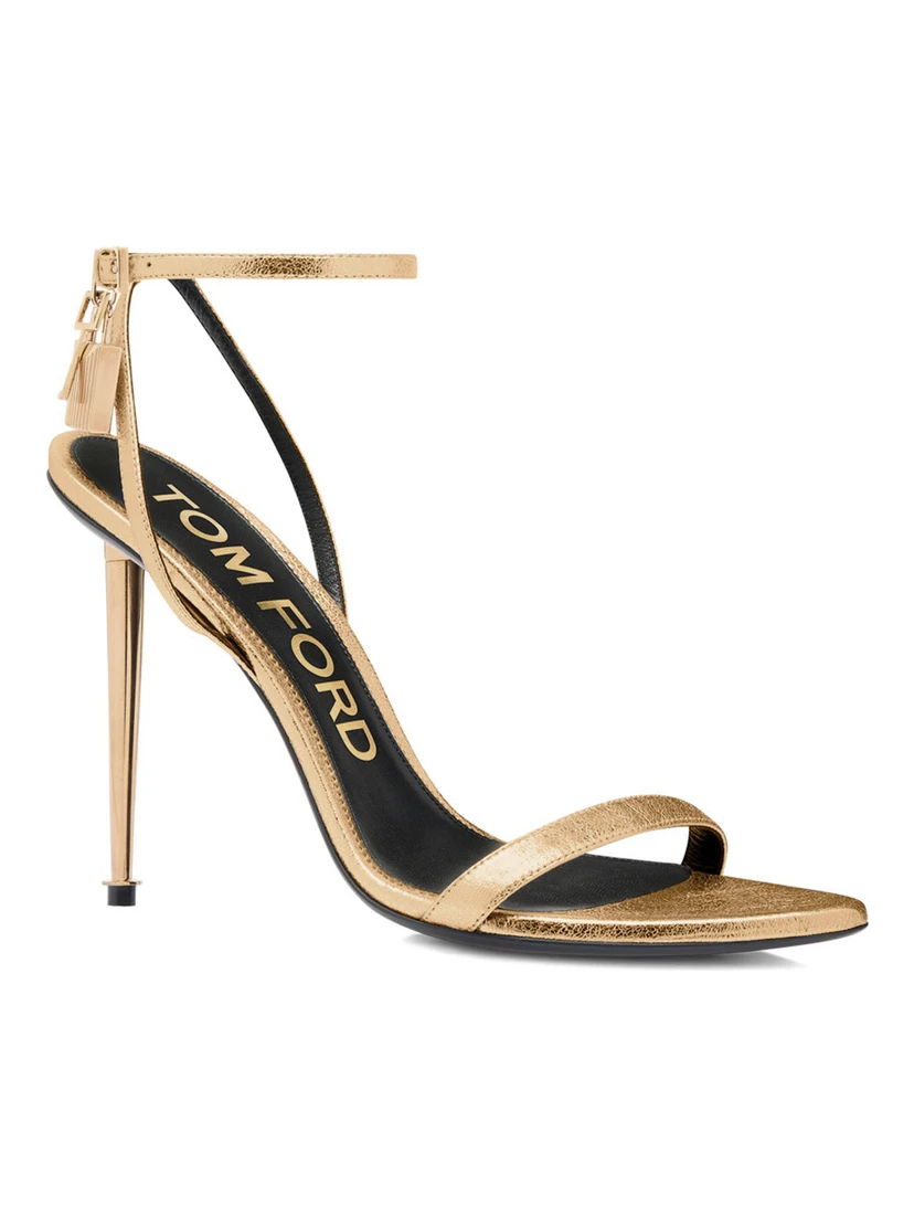 Gold Colored Pumps with High Stiletto Heel and Pendant Detail on the Ankle in Patent Leather Woman