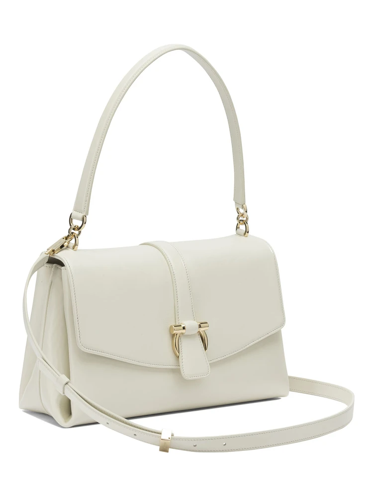 Leather shoulder bag with flap alternative