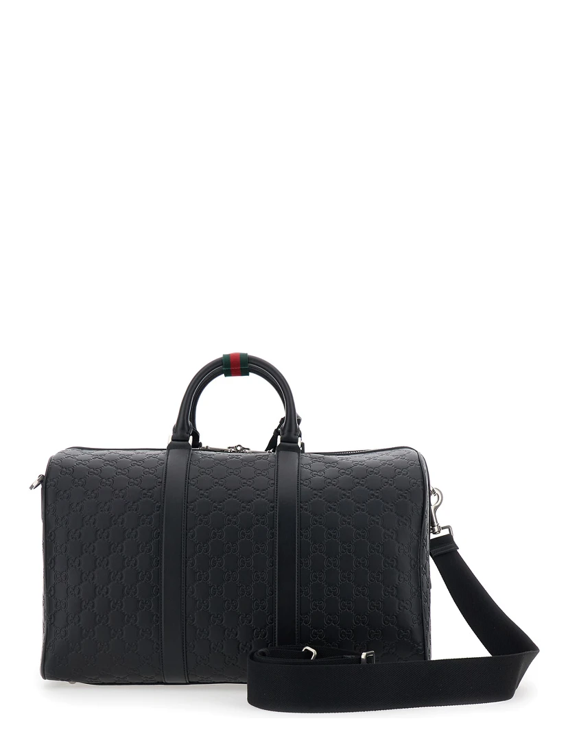 Emblem Black Suitcase with Adjustable and Removable Shoulder Strap and All-Over Embossed GG Motif in Leather Man