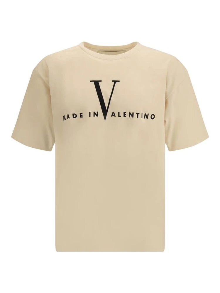 تيشيرت قطني كريمي اللون