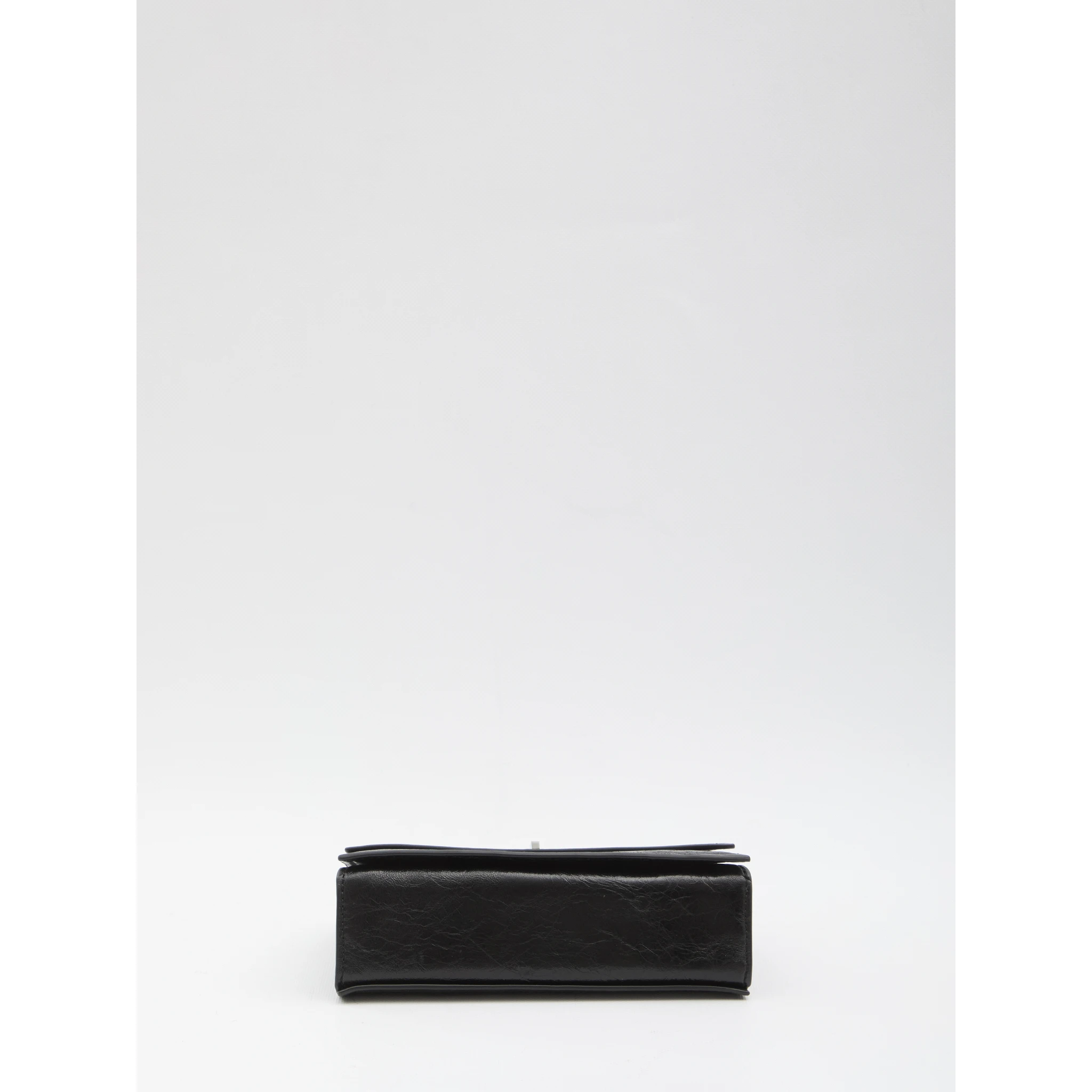 Kira Turnlock mini bag