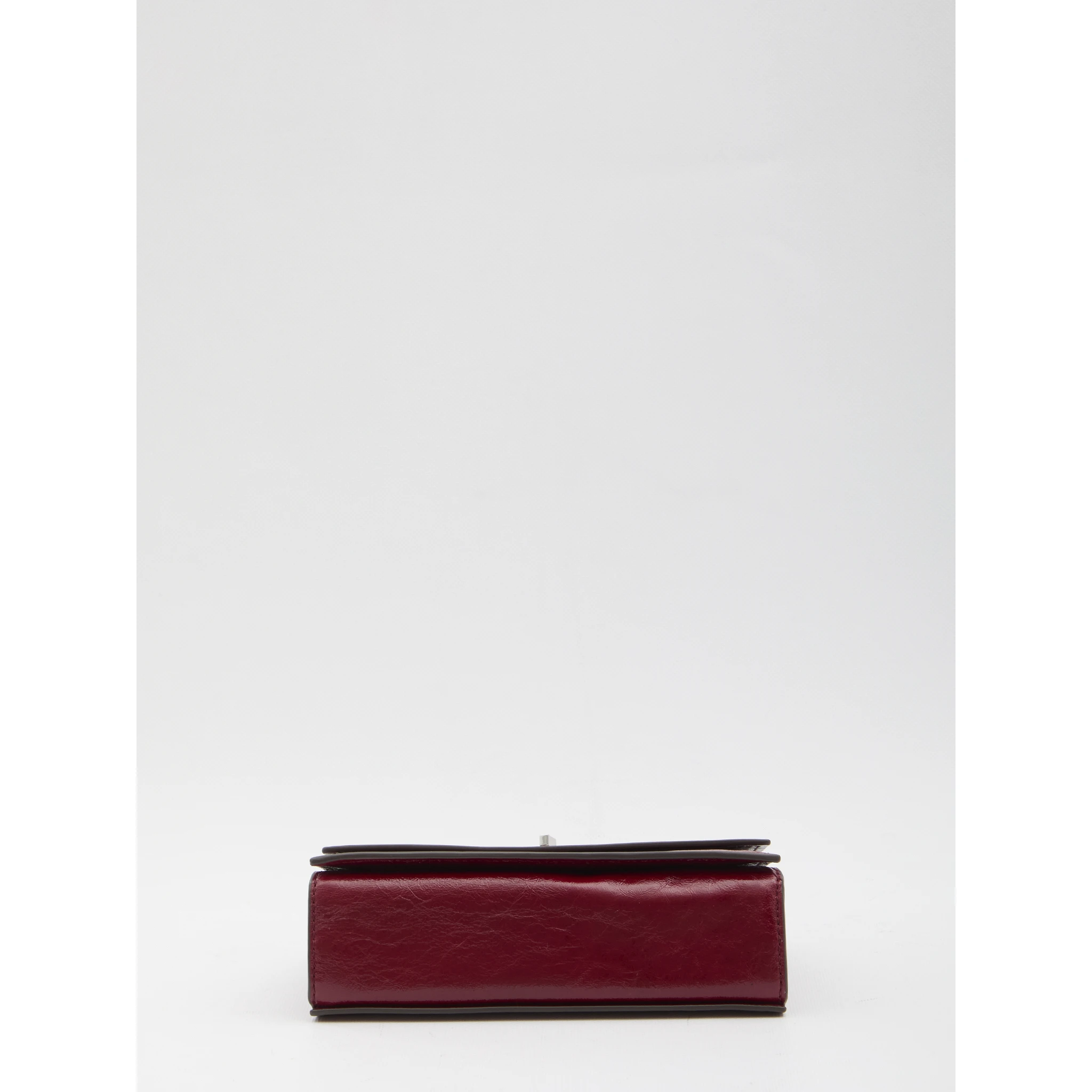 Kira Turnlock mini bag