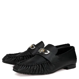 حذاء مسطح أسود من كريستيان لوبوتان