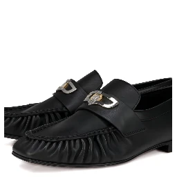 حذاء مسطح أسود من كريستيان لوبوتان