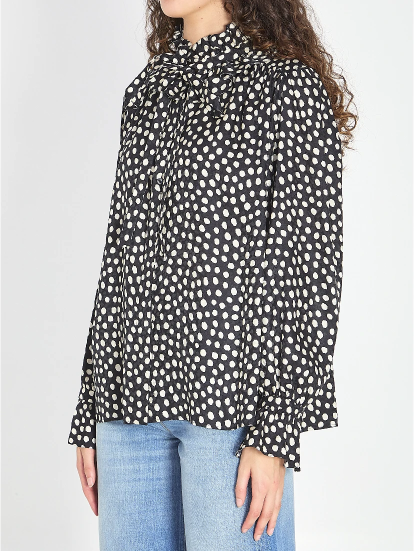 Polka dot blouse with ruffles