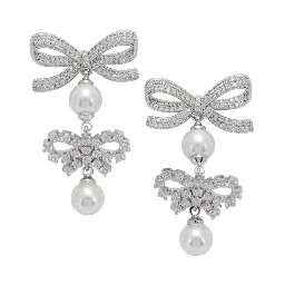 Earrings with bows and pearls