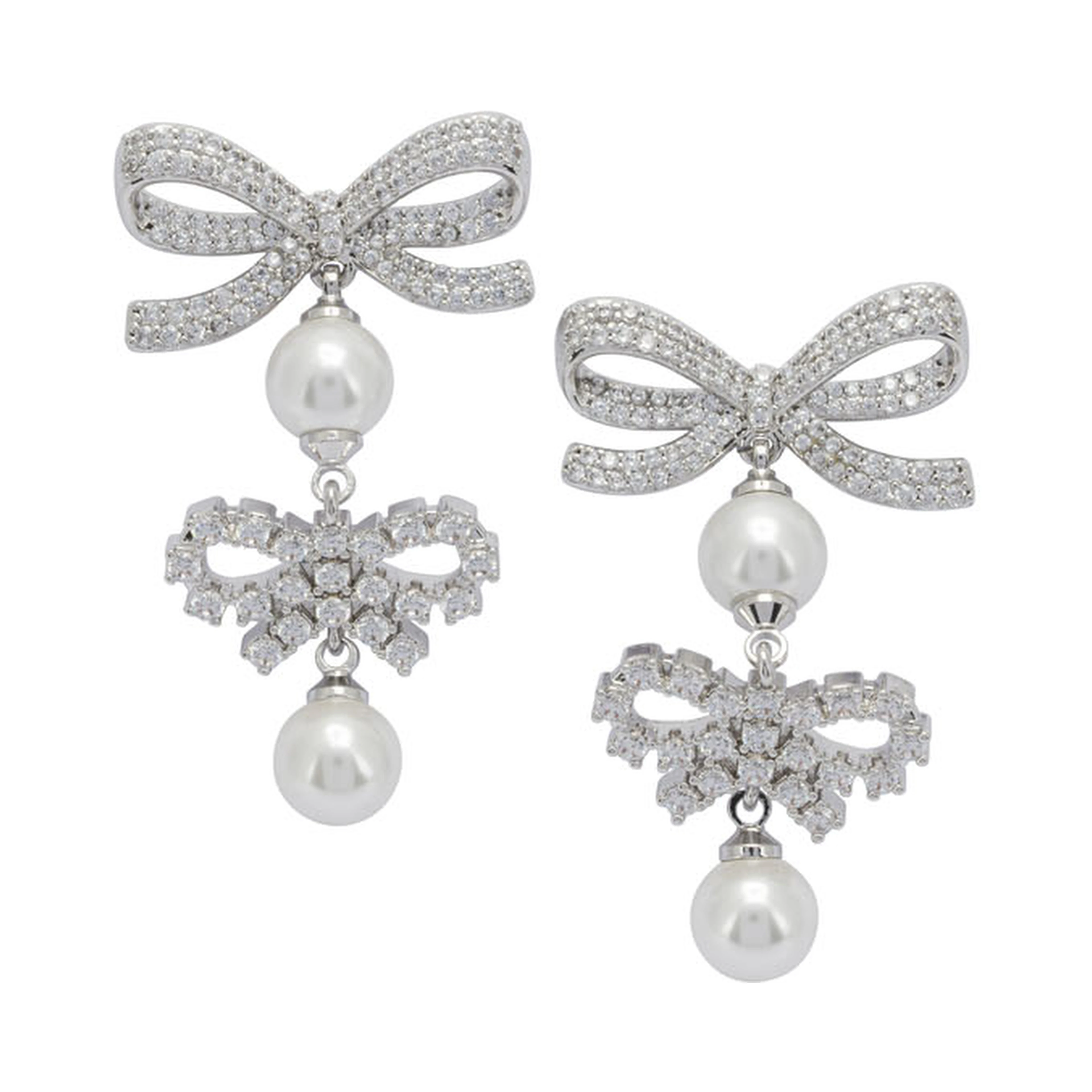 Earrings with bows and pearls