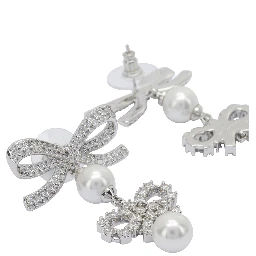 Earrings with bows and pearls
