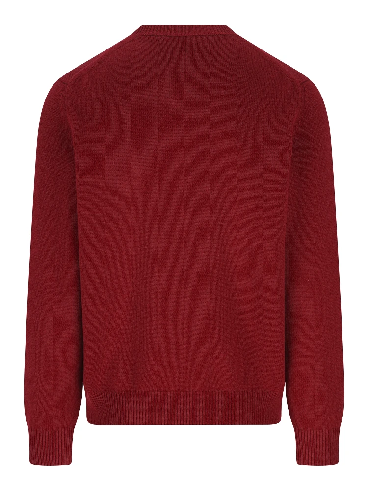 كنزة برقبة دائرية مزينة بشعار alternative