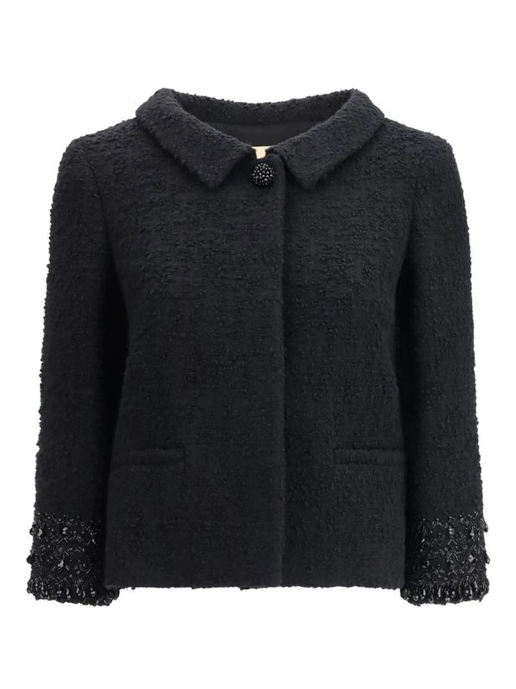 معطف صوف أسود