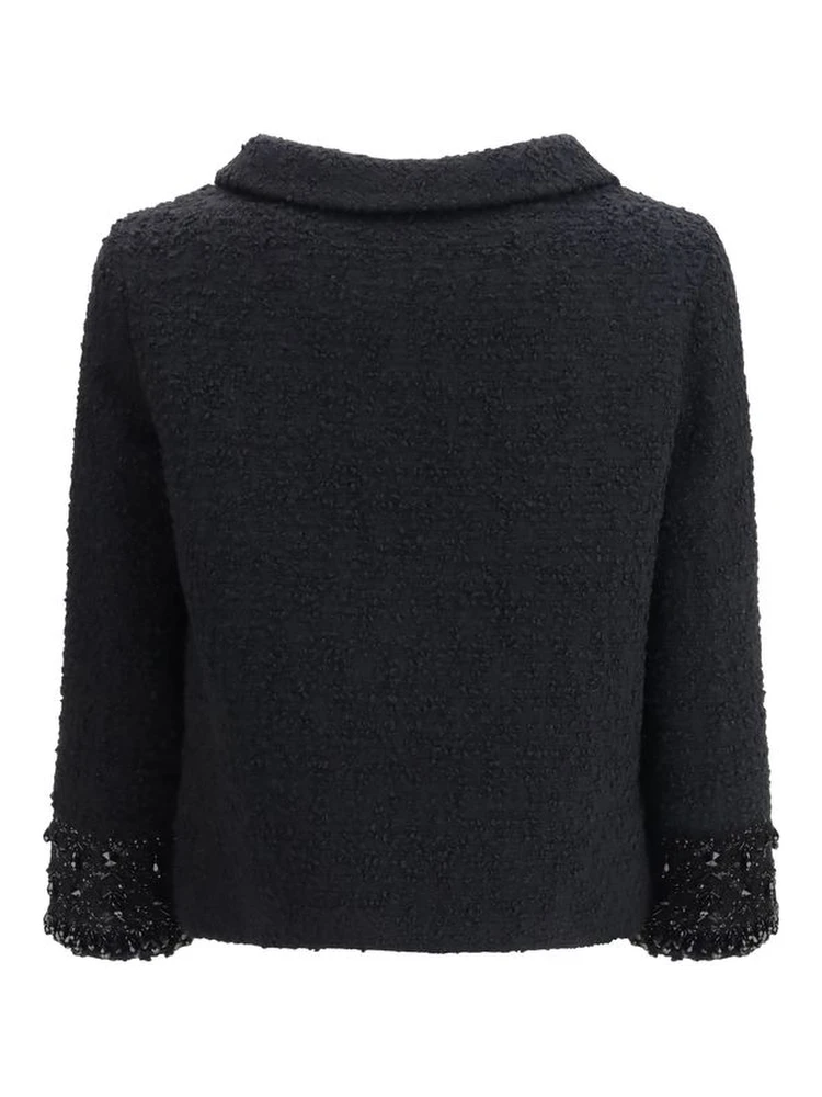 معطف صوف أسود alternative