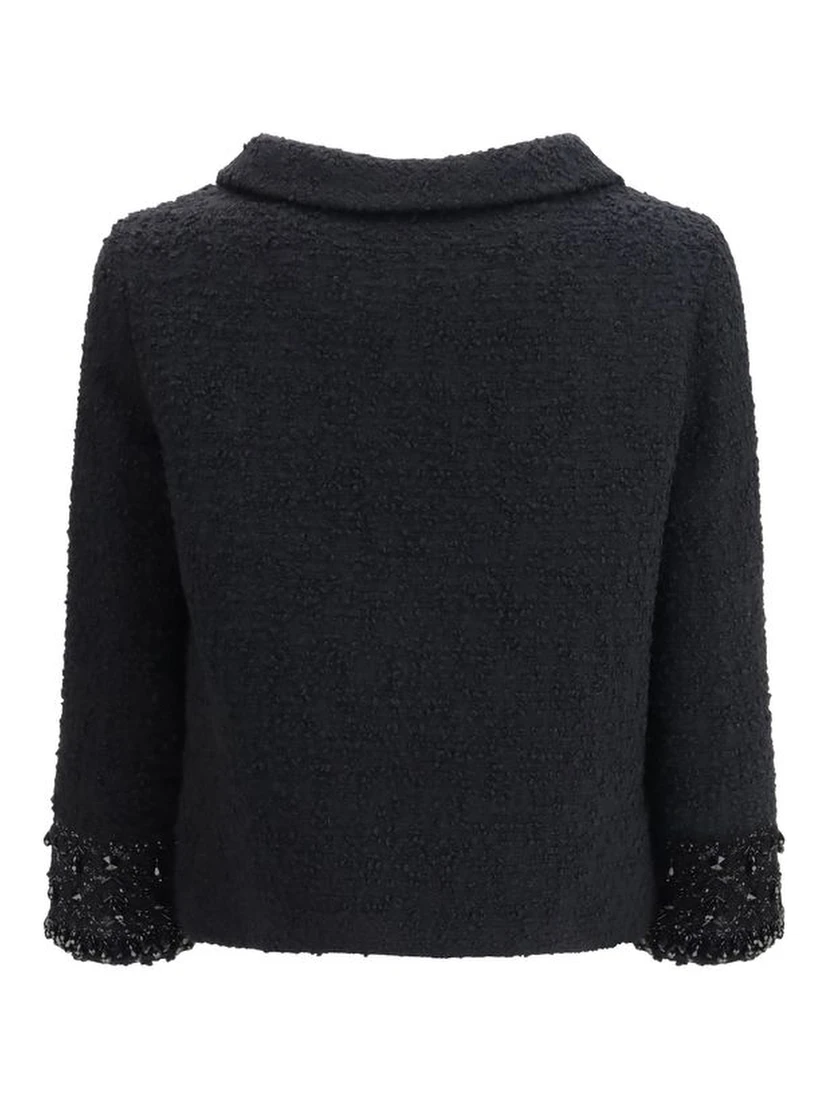 معطف صوف أسود