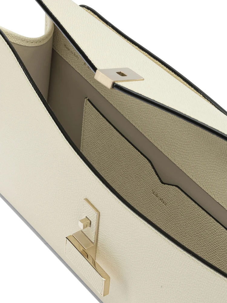 "Iside" leather clutch bag alternative