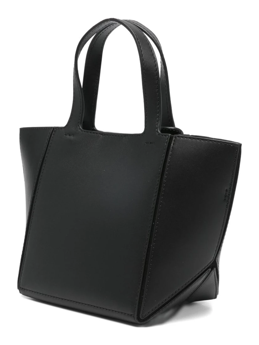 Black gold-tone hardware top handles bag