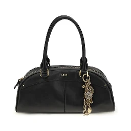 حقيبة كتف بوس توروس من جلد العجل الأسود